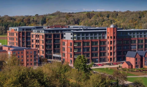 retirement in Keynsham - front shot of the chocolate quarter retirement village